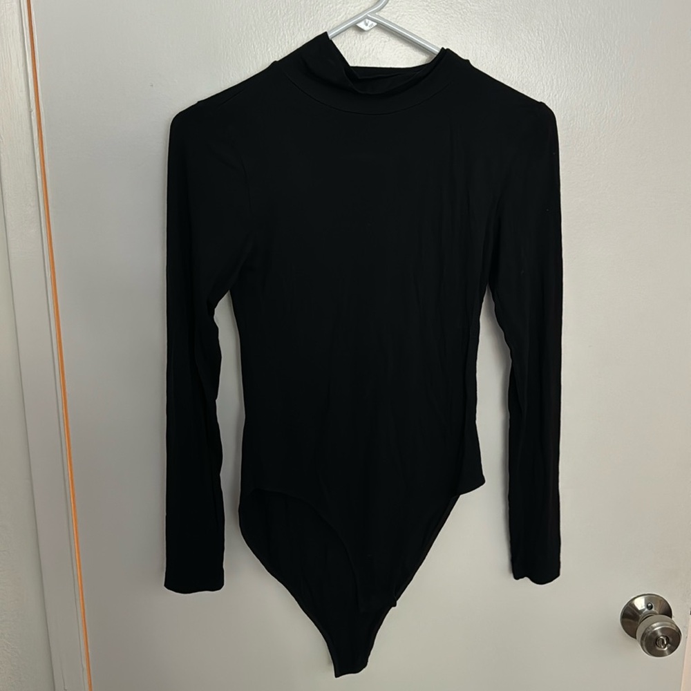 Pain black bodysuit. Never worn